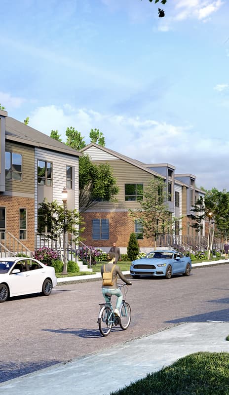 rendering of bicyclist rising down street with new development 2 story buildings